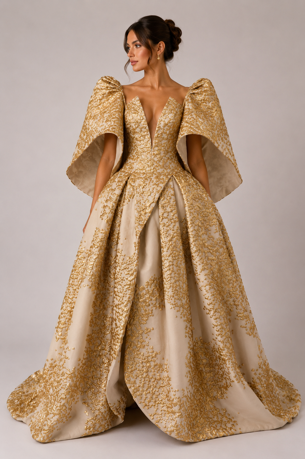 IVORY AND GOLD SCULPTURAL BALL GOWN