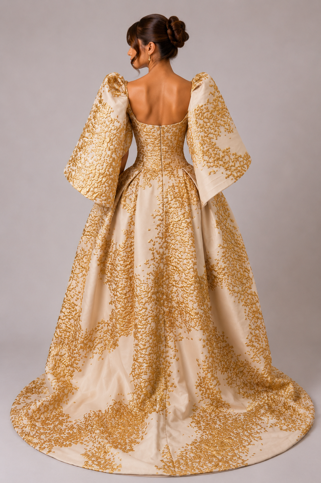 IVORY AND GOLD SCULPTURAL BALL GOWN